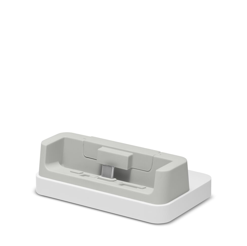 White and gray electronic device stand on a white background