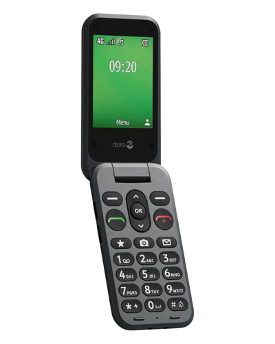 Flip phone with green screen displaying time and menu on a white background