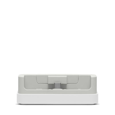 White electronic device with a gray cover on a white background